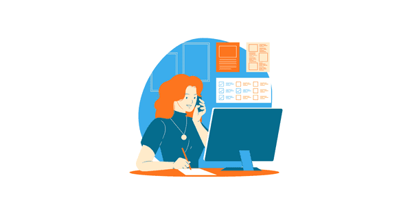 female employee working at her desk while on the phone